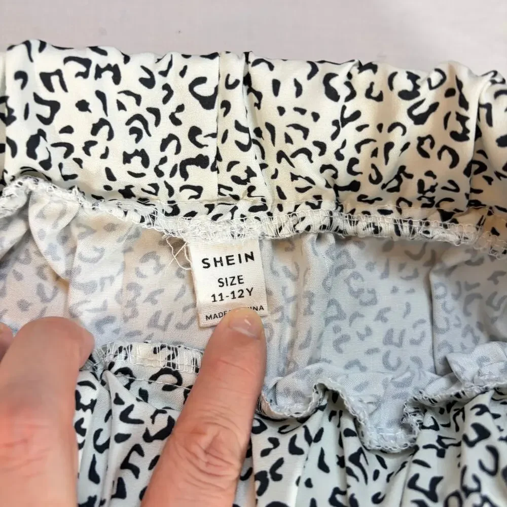 Girls White leopard print wide leg flowy pants. Size 11-12y. animal print, boho
